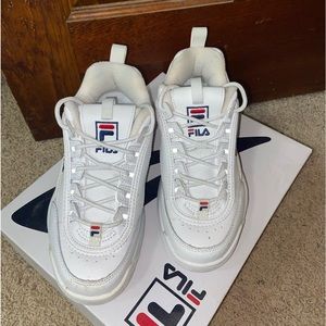 White Fila Shoes.